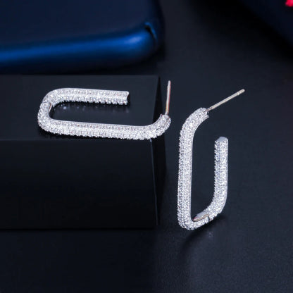 Whisper Loop Earrings – Double-Sided Sparkle in Sleek U-Shape