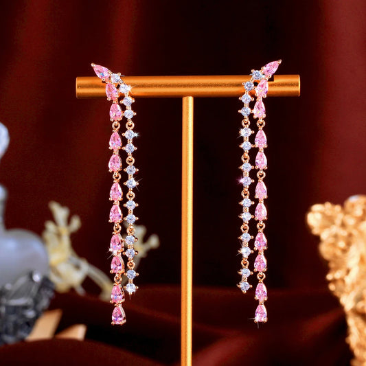 Blush Tassel Glow Drops | Delicate, feminine, and undeniably eye-catching.