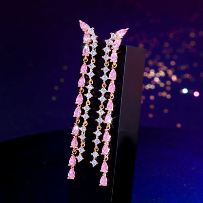Blush Tassel Glow Drops | Delicate, feminine, and undeniably eye-catching.