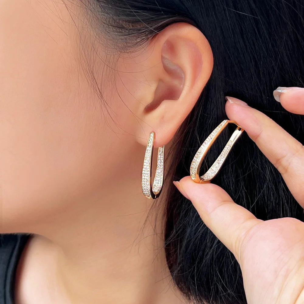 Sparkly Pave Hoop Earrings | Plated in white gold to bring elegance