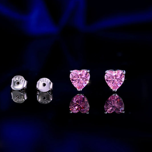 Heartlight Pink Studs | Featuring dazzling heart-cut pink cubic zirconia stones