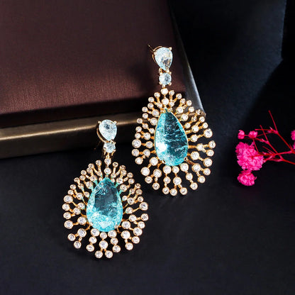 Blue Magic | Iced-Out Teardrop Earrings for a Bold Statement