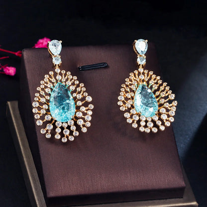 Blue Magic | Iced-Out Teardrop Earrings for a Bold Statement