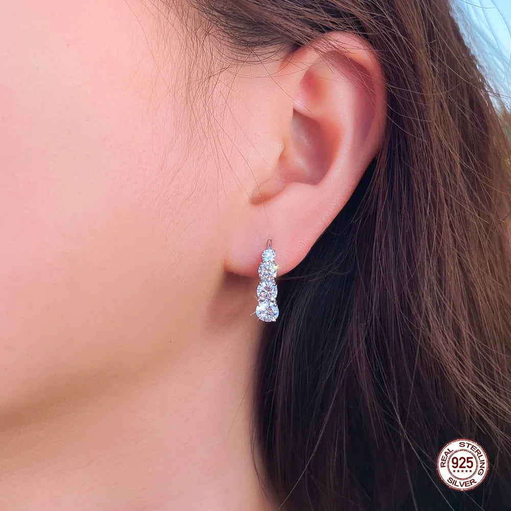 Cubic Zirconia Hoop Earrings | The round-cut zirconia stones