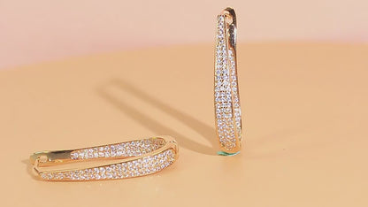 Sparkly Pave Hoop Earrings | Plated in white gold to bring elegance